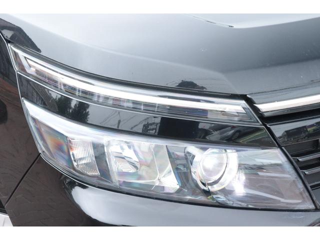 ヴォクシー Ｘ　走行距離無制限　１年保証　車検整備付き　ナビ　ＴＶ　Ｂカメラ　両側電動スライドドア　ＬＥＤヘッドライト　キーレス　ＥＴＣ　３列シート　ウォークスルー（7枚目）
