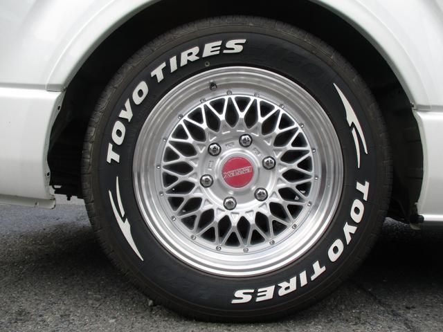 ハイエースバン ロングスーパーＧＬ　４ＷＤディーゼルターボ　ローダウン　プッシュスタート　ＬＥＤヘッドライト　フロントスポイラー　社外アルミ　ホワイトレタータイヤ　ナビ　バックカメラ　ＥＴＣ　ＡＣ１００Ｖコンセント（12枚目）