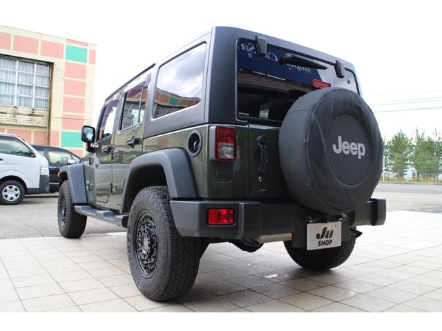 ジープ・ラングラーアンリミテッド スポーツ 4WD ブラックライノ17インチアルミ トーヨーオープンカントリー パイオニアフルセグナビ バックカメラ サイドカメラ ETC クルーズコントロール キーレス(5枚目)