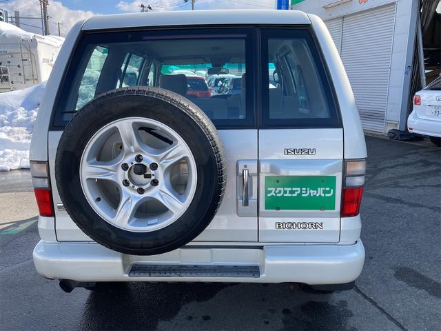 パールリミテッド プレジール 4WD 純正18インチアルミホイール キーレスエントリー 運・助手席エアバッグ パワーウインドウ エアコン ABS パワーステアリング 衝突安全ボディ 電動格納ミラー ターボ 修復歴無し(3枚目)