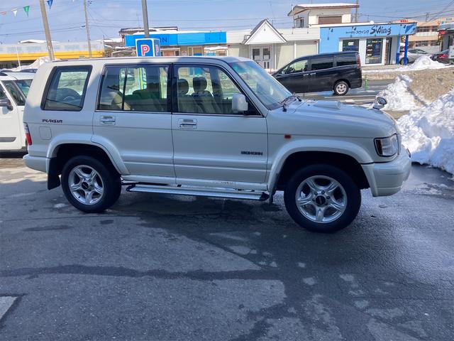 パールリミテッド プレジール 4WD 純正18インチアルミホイール キーレスエントリー 運・助手席エアバッグ パワーウインドウ エアコン ABS パワーステアリング 衝突安全ボディ 電動格納ミラー ターボ 修復歴無し(4枚目)