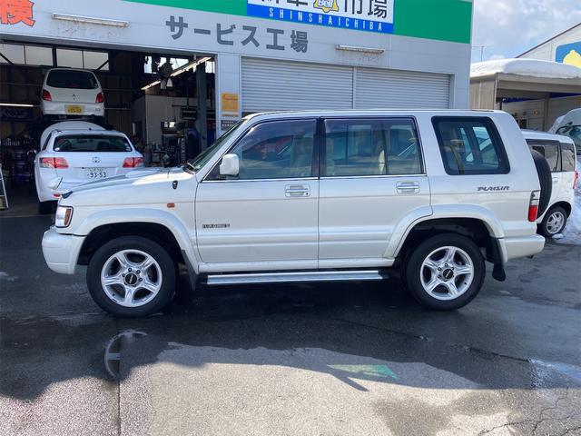 パールリミテッド プレジール 4WD 純正18インチアルミホイール キーレスエントリー 運・助手席エアバッグ パワーウインドウ エアコン ABS パワーステアリング 衝突安全ボディ 電動格納ミラー ターボ 修復歴無し(5枚目)