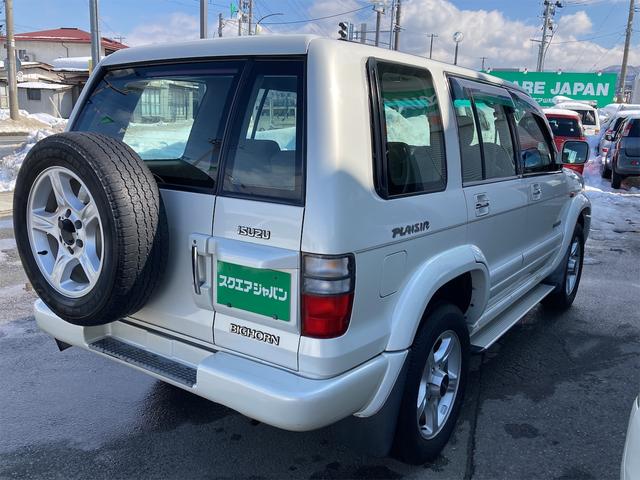 パールリミテッド プレジール 4WD 純正18インチアルミホイール キーレスエントリー 運・助手席エアバッグ パワーウインドウ エアコン ABS パワーステアリング 衝突安全ボディ 電動格納ミラー ターボ 修復歴無し(8枚目)