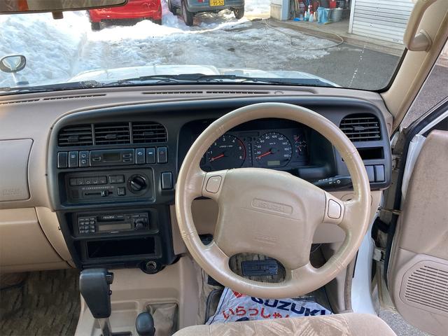 パールリミテッド プレジール 4WD 純正18インチアルミホイール キーレスエントリー 運・助手席エアバッグ パワーウインドウ エアコン ABS パワーステアリング 衝突安全ボディ 電動格納ミラー ターボ 修復歴無し(15枚目)