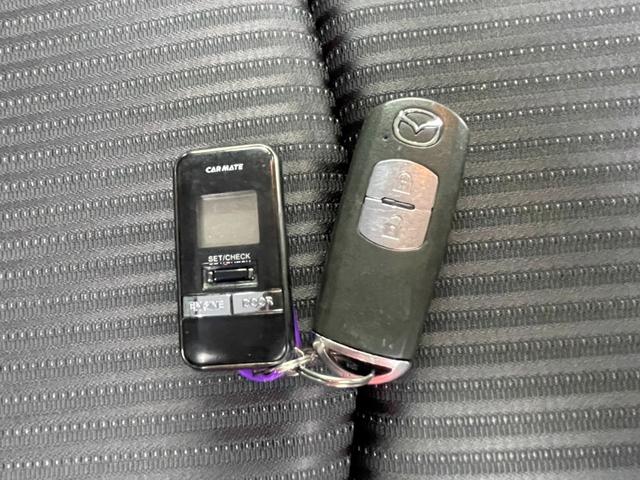 アクセラスポーツ １５Ｓ　４ＷＤ　スマートシティブレーキ　純正ナビ　地デジＴＶ　バックカメラ　　ＥＴＣ　Ｂｌｕｅｔｏｏｔｈ　ＥＧスターター　革巻きステアリング　ｉ－ｓｔｏｐ　純正１６アルミ　スマートキー（14枚目）