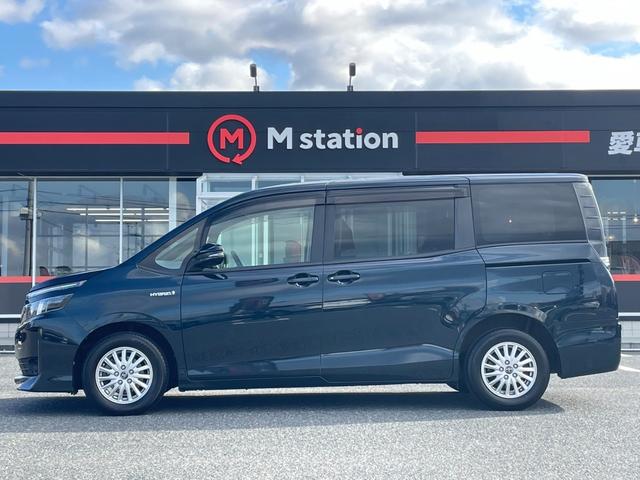 ヴォクシー ハイブリッドＶ　ワンオーナー　純正９型メモリーナビ　バックカメラ　パワースライドドア　ＬＥＤライト　スマートキー　クルーズコントロール　シートヒーター　純正１５アルミ　フルセグ　Ｂｌｕｅｔｏｏｔｈ（4枚目）