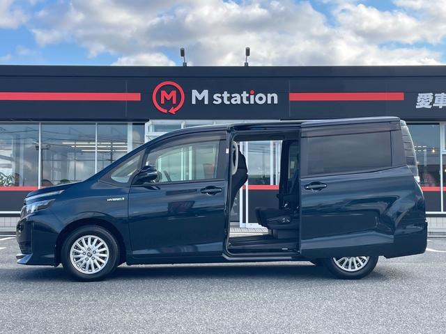 ヴォクシー ハイブリッドＶ　ワンオーナー　純正９型メモリーナビ　バックカメラ　パワースライドドア　ＬＥＤライト　スマートキー　クルーズコントロール　シートヒーター　純正１５アルミ　フルセグ　Ｂｌｕｅｔｏｏｔｈ（5枚目）