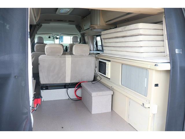 ハイエースバン キャンピングカー バンコン ホワイトハウス コンパスドルク FFヒーター DCクーラー マックスファン インバーター 冷蔵庫 リチウムイオンバッテリー 電子レンジ 外部充電(8枚目)