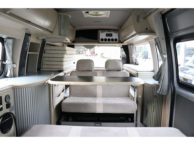 ハイエースバン キャンピングカー バンコン ホワイトハウス コンパスドルク FFヒーター DCクーラー マックスファン インバーター 冷蔵庫 リチウムイオンバッテリー 電子レンジ 外部充電(13枚目)