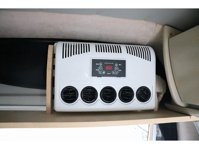 ハイエースバン キャンピングカー バンコン ホワイトハウス コンパスドルク FFヒーター DCクーラー マックスファン インバーター 冷蔵庫 リチウムイオンバッテリー 電子レンジ 外部充電(38枚目)
