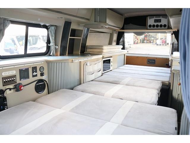 ハイエースバン キャンピングカー バンコン ホワイトハウス コンパスドルク FFヒーター DCクーラー マックスファン インバーター 冷蔵庫 リチウムイオンバッテリー 電子レンジ 外部充電(42枚目)