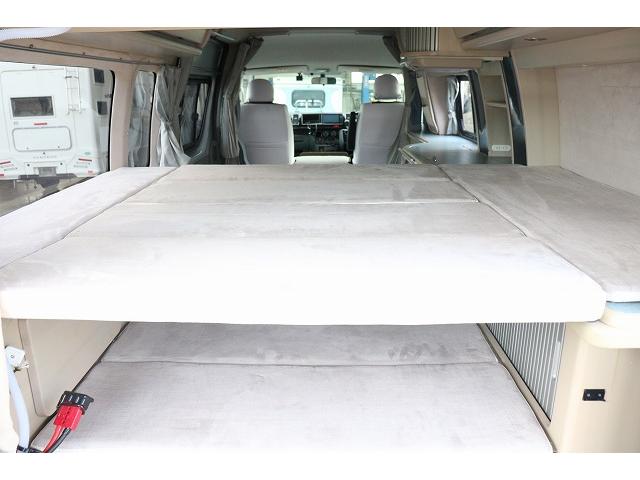 ハイエースバン キャンピングカー バンコン ホワイトハウス コンパスドルク FFヒーター DCクーラー マックスファン インバーター 冷蔵庫 リチウムイオンバッテリー 電子レンジ 外部充電(48枚目)