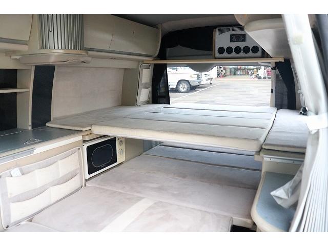 ハイエースバン キャンピングカー バンコン ホワイトハウス コンパスドルク FFヒーター DCクーラー マックスファン インバーター 冷蔵庫 リチウムイオンバッテリー 電子レンジ 外部充電(51枚目)