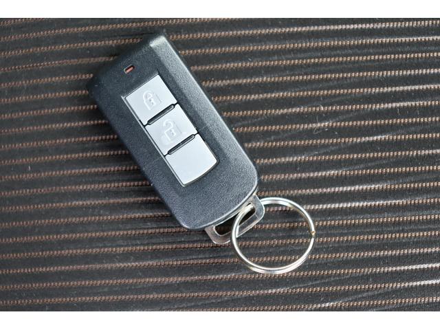 ｅＫカスタム Ｇ　車検整備付　１年保証　走行距離無制限　４ＷＤ　ＡＢＳ　アイドリングストップ　スマートキー　プッシュスタート　ＨＩＤ　フォグランプ　シートヒーター　社外ナビ　ワンセグＴＶ　バックカメラ　純正１４インチ（32枚目）