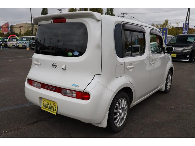 キューブ １５Ｘ　Ｖセレクション　車検整備付　１年保証付　走行距離無制限　スマートキー　プッシュスタート　ＥＴＣ　アイドリングストップ　フォグランプ　純正ナビ　ワンセグＴＶ　バックカメラ　社外１５インチアルミ（6枚目）