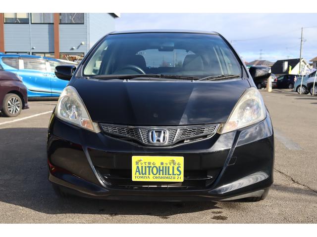 フィット 13G・スマートセレクション ファインスタイル 車検整備付 1年保証 走行距離無制限 スマートキー ETC HIDライト 純正ナビ ワンセグTV DVD再生 バックカメラ(4枚目)