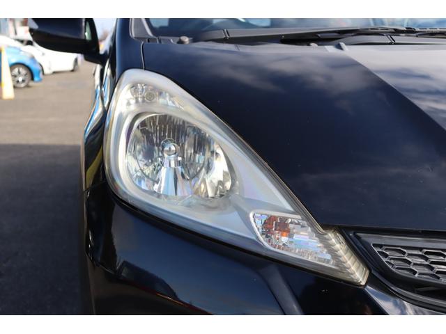 フィット 13G・スマートセレクション ファインスタイル 車検整備付 1年保証 走行距離無制限 スマートキー ETC HIDライト 純正ナビ ワンセグTV DVD再生 バックカメラ(9枚目)