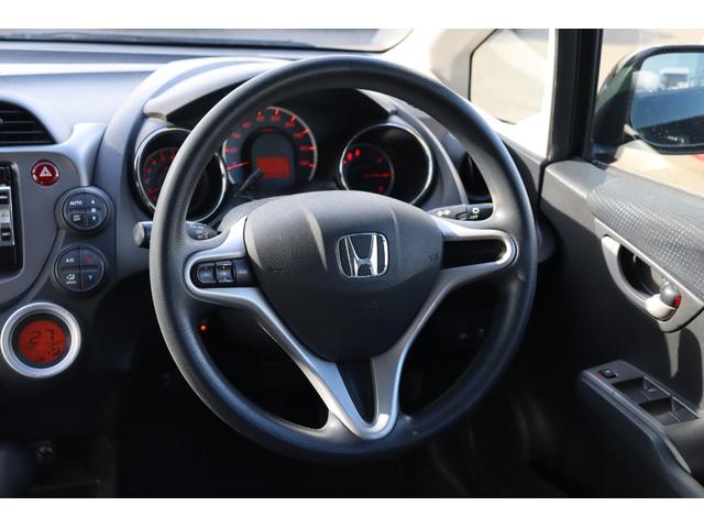 フィット 13G・スマートセレクション ファインスタイル 車検整備付 1年保証 走行距離無制限 スマートキー ETC HIDライト 純正ナビ ワンセグTV DVD再生 バックカメラ(16枚目)