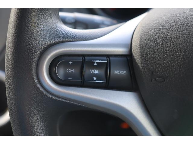 フィット 13G・スマートセレクション ファインスタイル 車検整備付 1年保証 走行距離無制限 スマートキー ETC HIDライト 純正ナビ ワンセグTV DVD再生 バックカメラ(31枚目)