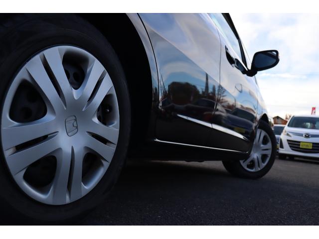 フィット 13G・スマートセレクション ファインスタイル 車検整備付 1年保証 走行距離無制限 スマートキー ETC HIDライト 純正ナビ ワンセグTV DVD再生 バックカメラ(38枚目)