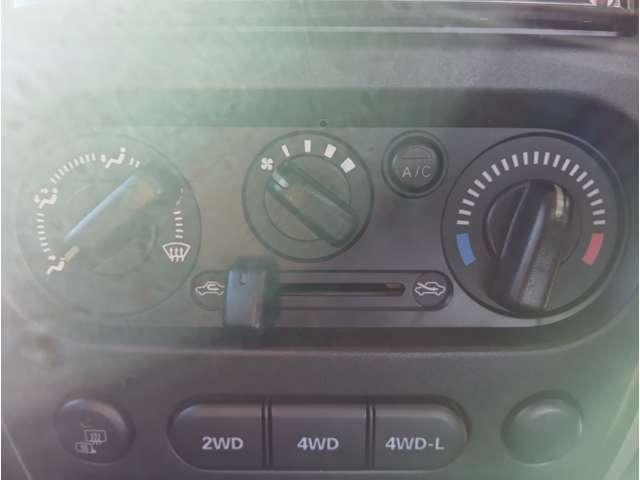 ジムニー XC シルキーシルバーメタリック 5MT パートタイム4WD 社外16インチAW フォグランプ キーレスエントリー 電格ミラー 社外ナビ フルセグTV ETC 取説・記録簿 保証付き(19枚目)