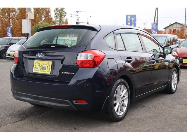 インプレッサスポーツ ２．０ｉ　車検整備付　１年保証付　走行距離無制限　キーレス　オートクルーズ　ＥＴＣ　フォグランプ　社外ナビ　フルセグＴＶ　Ｂｌｕｅｔｏｏｔｈ　ＤＶＤ再生　バックカメラ　純１６アルミ　アイドリングストップ（6枚目）
