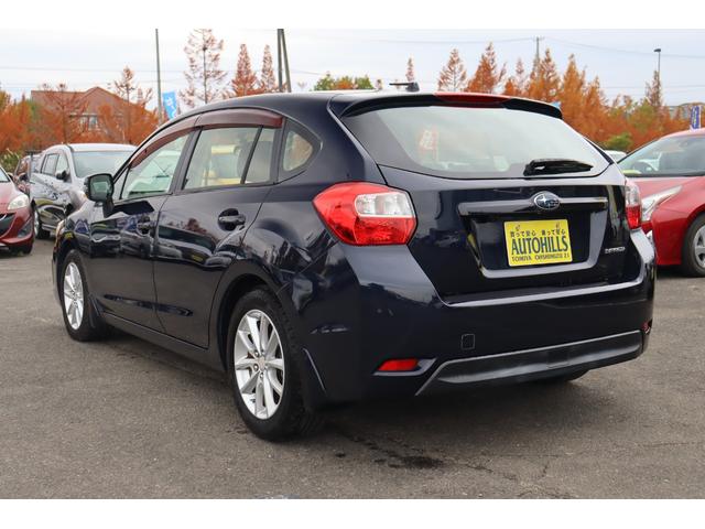 インプレッサスポーツ ２．０ｉ　車検整備付　１年保証付　走行距離無制限　キーレス　オートクルーズ　ＥＴＣ　フォグランプ　社外ナビ　フルセグＴＶ　Ｂｌｕｅｔｏｏｔｈ　ＤＶＤ再生　バックカメラ　純１６アルミ　アイドリングストップ（7枚目）