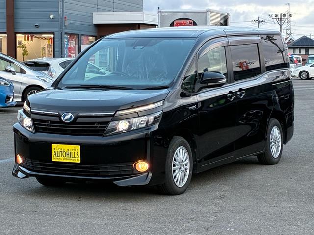 ヴォクシー ハイブリッドV ワンオーナー トヨタセーフティセンス 10型フルセグナビ フリップダウンモニター エンジンスターター バックカメラ LEDヘッドライト 左側電動スライドドア スマートキー プッシュスタート(2枚目)
