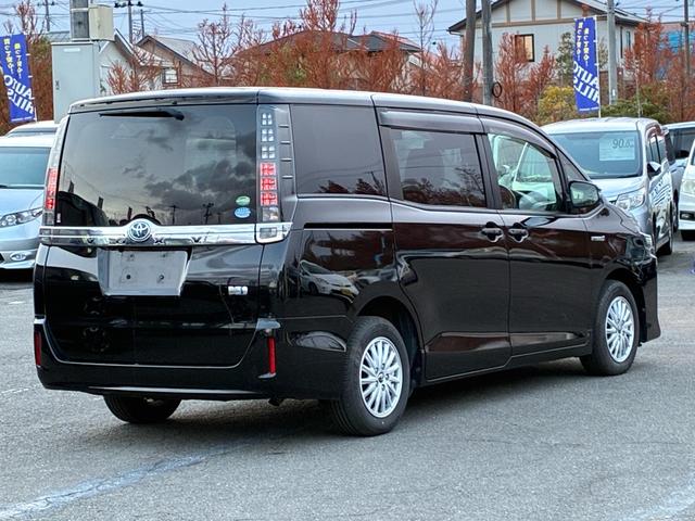 ヴォクシー ハイブリッドV ワンオーナー トヨタセーフティセンス 10型フルセグナビ フリップダウンモニター エンジンスターター バックカメラ LEDヘッドライト 左側電動スライドドア スマートキー プッシュスタート(26枚目)