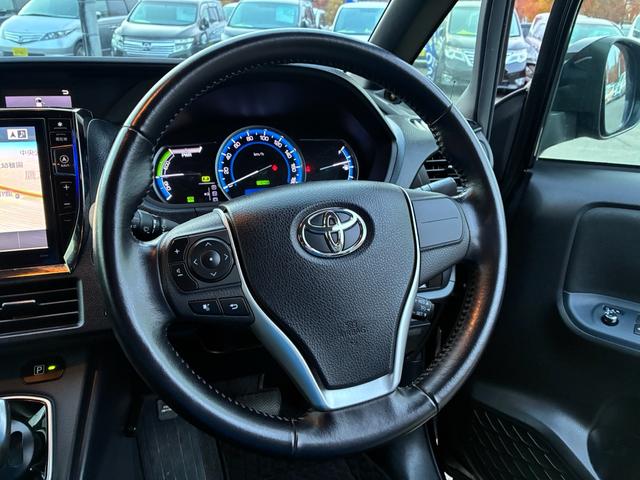 ヴォクシー ハイブリッドV ワンオーナー トヨタセーフティセンス 10型フルセグナビ フリップダウンモニター エンジンスターター バックカメラ LEDヘッドライト 左側電動スライドドア スマートキー プッシュスタート(31枚目)