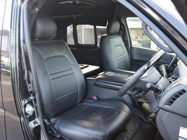 ハイエースバン スーパーGL ダークプライムII フルカスタムオフロードスタイル ユーアイショック&スタビライザー ビックXナビ&フリップダウンモニター シートカバー 片側跳ね上げベットキット 床板パネル 網戸 NT-1アルミ TRタイヤ(4枚目)