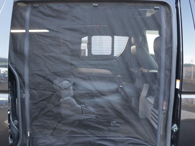 ハイエースバン スーパーGL ダークプライムII フルカスタムオフロードスタイル ユーアイショック&スタビライザー ビックXナビ&フリップダウンモニター シートカバー 片側跳ね上げベットキット 床板パネル 網戸 NT-1アルミ TRタイヤ(35枚目)