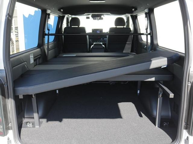 ハイエースバン ロングスーパーGL ダークプライムS 登録済み未使用車ダークプライムS ビックX11インチデカナビ ETC 両側パワースライドドア ベットキット デルフ06アルミホイル18インチ パラダタイヤ オメガLEDテール(14枚目)