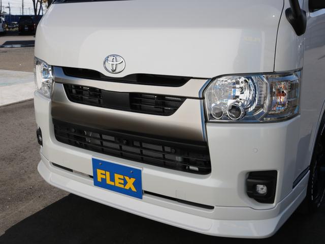 ハイエースバン ロングスーパーGL ダークプライムS 登録済み未使用車ダークプライムS ビックX11インチデカナビ ETC 両側パワースライドドア ベットキット デルフ06アルミホイル18インチ パラダタイヤ オメガLEDテール(44枚目)