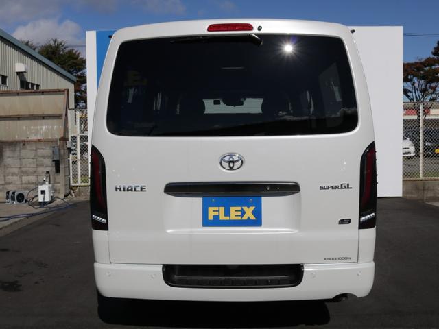 ハイエースバン ロングスーパーGL ダークプライムS 登録済み未使用車ダークプライムS ビックX11インチデカナビ ETC 両側パワースライドドア ベットキット デルフ06アルミホイル18インチ パラダタイヤ オメガLEDテール(66枚目)