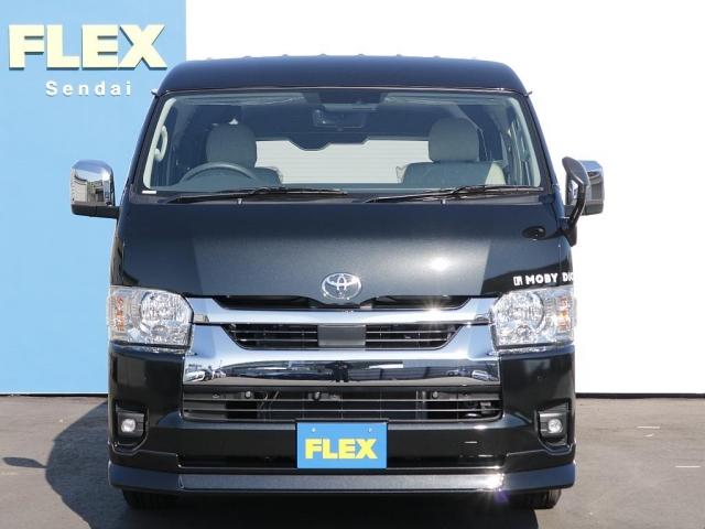 ハイエースワゴン GL MOBY DICKシリーズ【ORCA】 7人乗り リクライニングマット 8ナンバーキャンピングカー FFヒーター 40リットル冷蔵庫 12リットル排水.給水タンク 伸縮式シャワーヘッド付きシンク(2枚目)