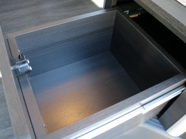 ハイエースワゴン GL MOBY DICKシリーズ【ORCA】 7人乗り リクライニングマット 8ナンバーキャンピングカー FFヒーター 40リットル冷蔵庫 12リットル排水.給水タンク 伸縮式シャワーヘッド付きシンク(27枚目)