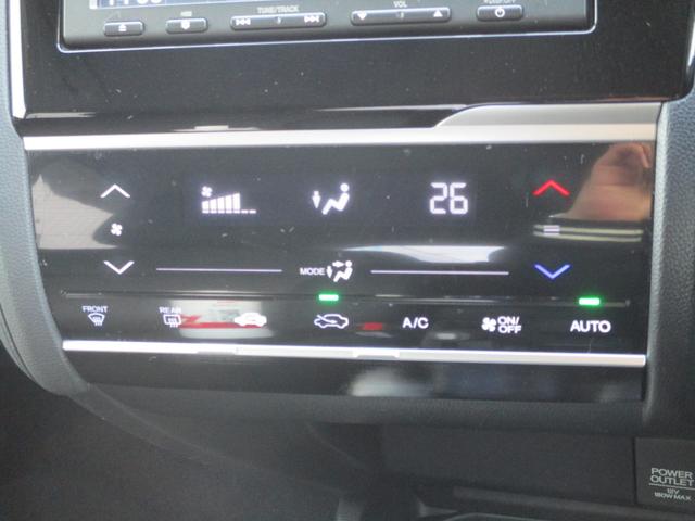 フィットハイブリッド Ｆパッケージ　純正ナビ　バックカメラ　ＣＤ　ステアリングスイッチ　オートエアコン　スマートキー＆プッシュスタート　横滑り防止（ＶＳＡ）　ホンダセンシング（7枚目）