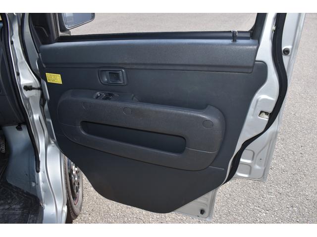 ハイゼットカーゴ ＤＸ　パートタイム４ＷＤ／エアバック／プライバシーガラス／両側スライドドア／オートマ車／同色オールペイント／保証付き（9枚目）