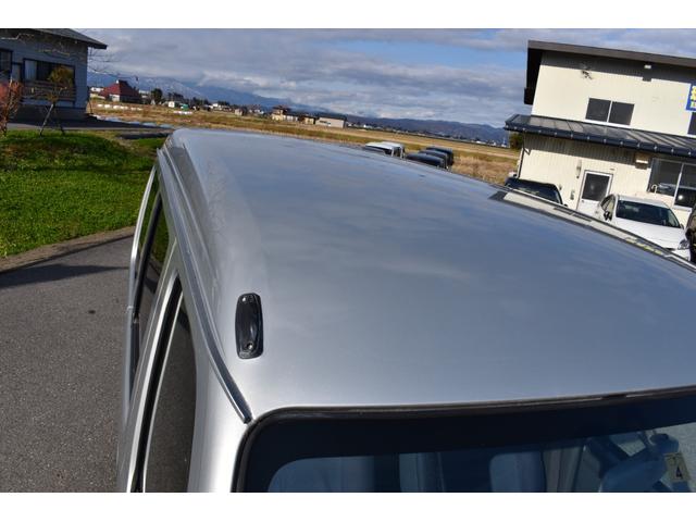 ハイゼットカーゴ ＤＸ　パートタイム４ＷＤ／エアバック／プライバシーガラス／両側スライドドア／オートマ車／同色オールペイント／保証付き（10枚目）