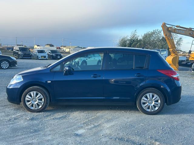 ティーダ 15M スマートキー 純正オーディオ ハーフレザーシート オートエアコン 電動格納ミラー 15インチタイヤ タイミングチェーン(11枚目)