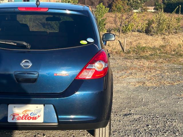 ティーダ 15M スマートキー 純正オーディオ ハーフレザーシート オートエアコン 電動格納ミラー 15インチタイヤ タイミングチェーン(14枚目)