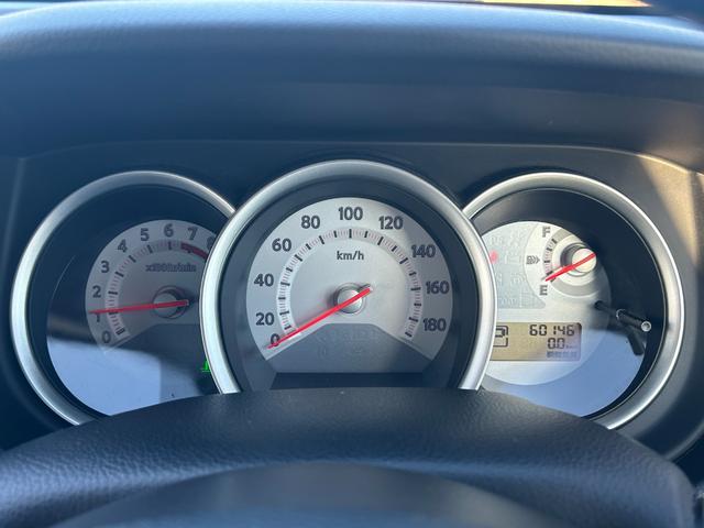 ティーダ 15M スマートキー 純正オーディオ ハーフレザーシート オートエアコン 電動格納ミラー 15インチタイヤ タイミングチェーン(16枚目)