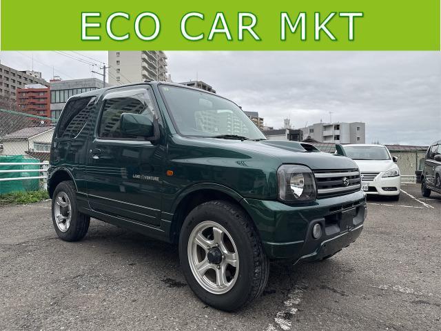 ジムニー ランドベンチャー　４ＷＤ　ＥＴＣ　電動格納ミラー　ＡＴ　ＡＢＳ　ＣＤ　ＭＤ　革シート　アルミホイール　衝突安全ボディ　エアコン　パワーステアリング　パワーウィンドウ　エンジンスターター　ワンセグナビ　レンタカー（4枚目）