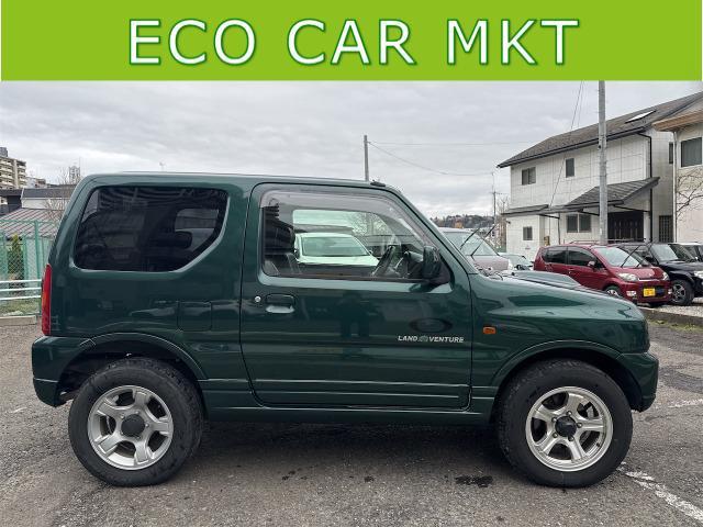 ジムニー ランドベンチャー　４ＷＤ　ＥＴＣ　電動格納ミラー　ＡＴ　ＡＢＳ　ＣＤ　ＭＤ　革シート　アルミホイール　衝突安全ボディ　エアコン　パワーステアリング　パワーウィンドウ　エンジンスターター　ワンセグナビ　レンタカー（6枚目）