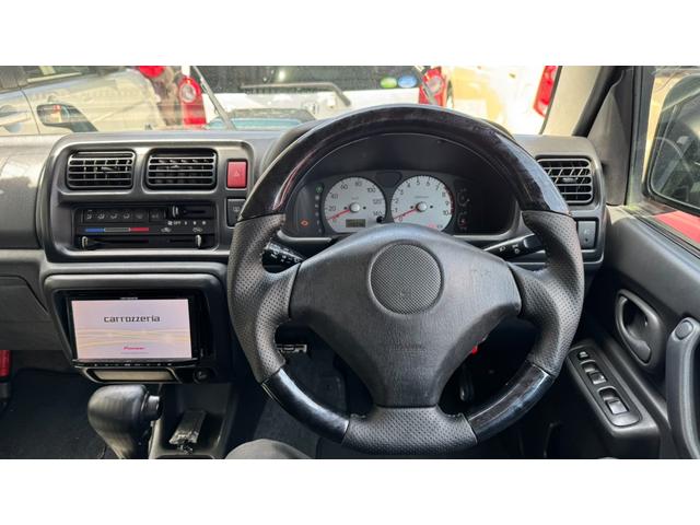 ジムニー ランドベンチャー　４ＷＤ　ＥＴＣ　電動格納ミラー　ＡＴ　ＡＢＳ　ＣＤ　ＭＤ　革シート　アルミホイール　衝突安全ボディ　エアコン　パワーステアリング　パワーウィンドウ　エンジンスターター　ワンセグナビ　レンタカー（24枚目）
