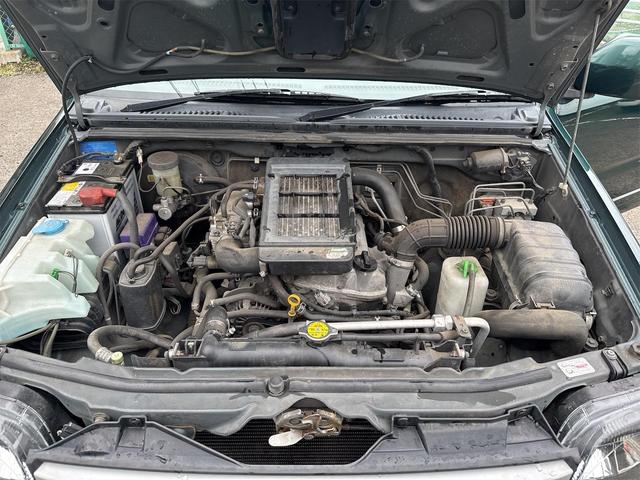 ジムニー ランドベンチャー　４ＷＤ　ＥＴＣ　電動格納ミラー　ＡＴ　ＡＢＳ　ＣＤ　ＭＤ　革シート　アルミホイール　衝突安全ボディ　エアコン　パワーステアリング　パワーウィンドウ　エンジンスターター　ワンセグナビ　レンタカー（30枚目）