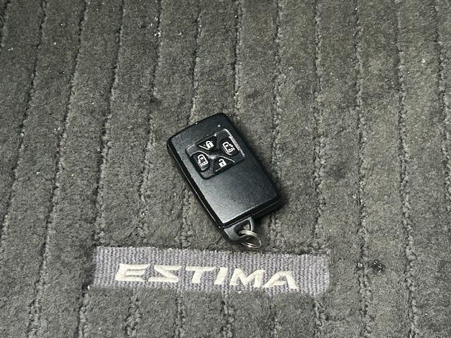 エスティマ アエラス　プレミアムエディション　保証付　禁煙車　７人乗　ローダウン　外品２０ＡＷ　モデリスタグリル　両側電動スライドドア　純正８型ナビ　フリップダウンモニター　ＴＶ　Ｂカメラ　クルコン　プッシュ＆スマートキー　ＥＴＣ（12枚目）