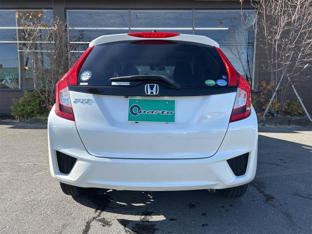 フィット １３Ｇ・Ｆパッケージ　ＥＴＣ　ナビ　衝突被害軽減システム　アルミホイール　スマートキー　アイドリングストップ　電動格納ミラー　フルフラット　ＣＶＴ　盗難防止システム　衝突安全ボディ　ＡＢＳ　ＥＳＣ　ＵＳＢ（5枚目）