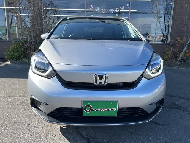 フィット ｅ：ＨＥＶベーシック　バックカメラ　ナビ　ＴＶ　クリアランスソナー　オートクルーズコントロール　衝突被害軽減システム　オートライト　ＬＥＤヘッドランプ　スマートキー　アイドリングストップ　電動格納ミラー　ＣＶＴ（2枚目）